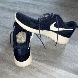 Nike Black Mesh Sneakers with White Swoosh